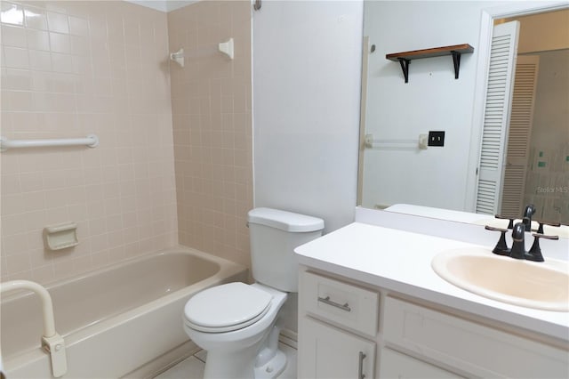 bathroom with toilet, vanity, tub / shower combination, and a closet