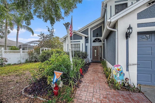 8704 Tarrington Pl, Tampa, FL 33635 - property entrance featuring stucco siding