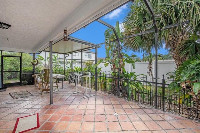 8704 Tarrington Pl, Tampa, FL 33635 - sunroom / solarium with outdoor dining space