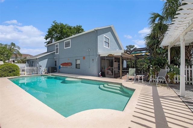 8704 Tarrington Pl, Tampa, FL 33635 - swimming pool with a patio area, central AC unit, and a pergola