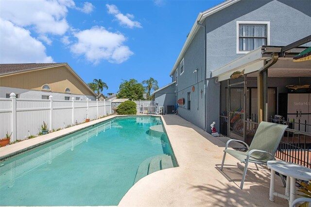 8704 Tarrington Pl, Tampa, FL 33635 - view of swimming pool featuring a fenced backyard and a patio area