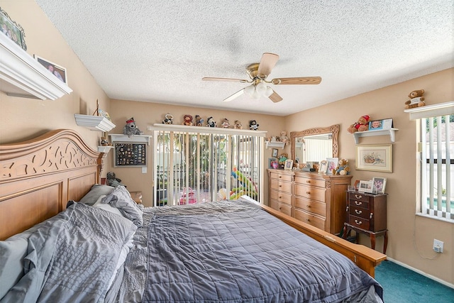 8704 Tarrington Pl, Tampa, FL 33635 - carpeted bedroom with access to exterior, a textured ceiling, and a ceiling fan