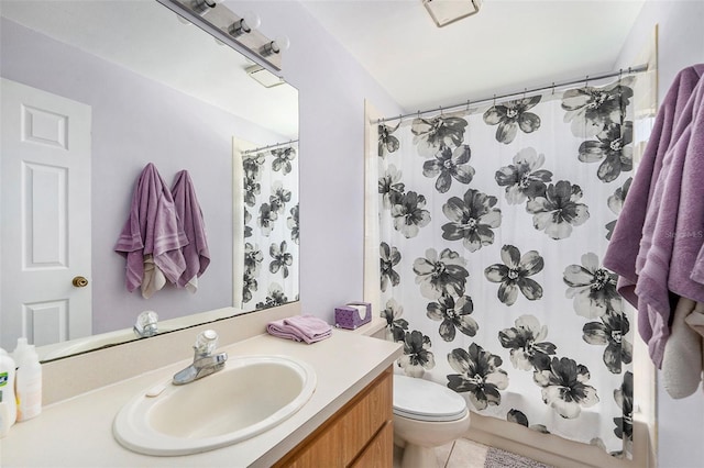 8704 Tarrington Pl, Tampa, FL 33635 - bathroom featuring vanity, toilet, curtained shower, and tile patterned floors