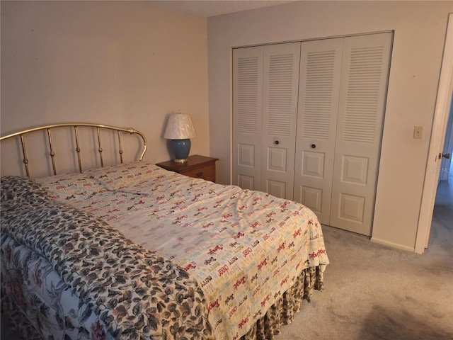 carpeted bedroom with a closet