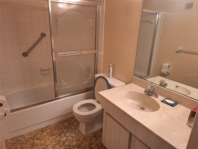 full bath featuring vanity, visible vents, toilet, and enclosed tub / shower combo