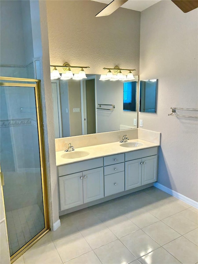 1201 Ventana Dr, Sun City Center, FL 33573 - full bath featuring a shower stall, tile patterned floors, and a sink