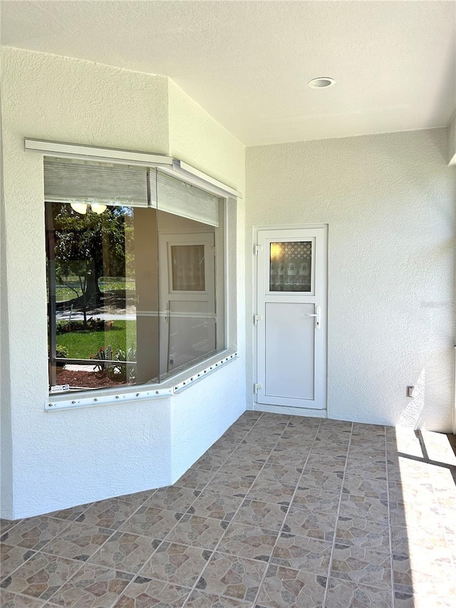1201 Ventana Dr, Sun City Center, FL 33573 - entrance to property with stucco siding