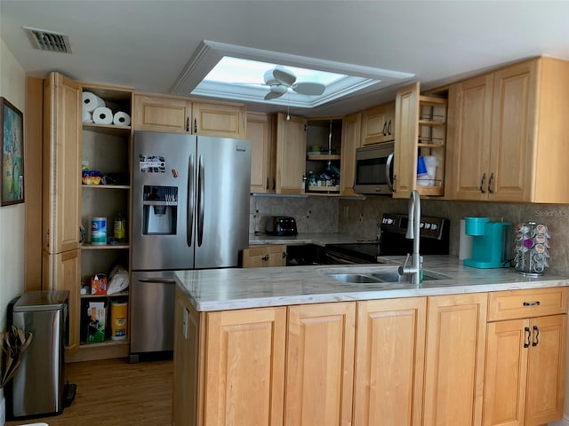 776 Lakewood Dr, Palm Harbor, FL 34684 - kitchen with a peninsula, backsplash, open shelves, visible vents, and appliances with stainless steel finishes