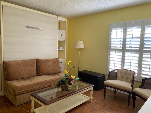 776 Lakewood Dr, Palm Harbor, FL 34684 - living room featuring a textured ceiling
