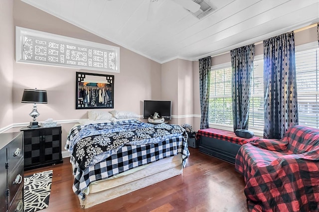 9520 Indale Dr, New Port Richey, FL 34654 - bedroom featuring vaulted ceiling, crown molding, wood finished floors, and visible vents