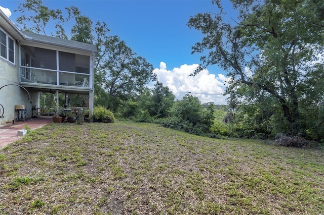 9520 Indale Dr, New Port Richey, FL 34654 - view of yard featuring a sunroom