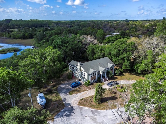 9520 Indale Dr, New Port Richey, FL 34654 - drone / aerial view featuring a forest view and a water view