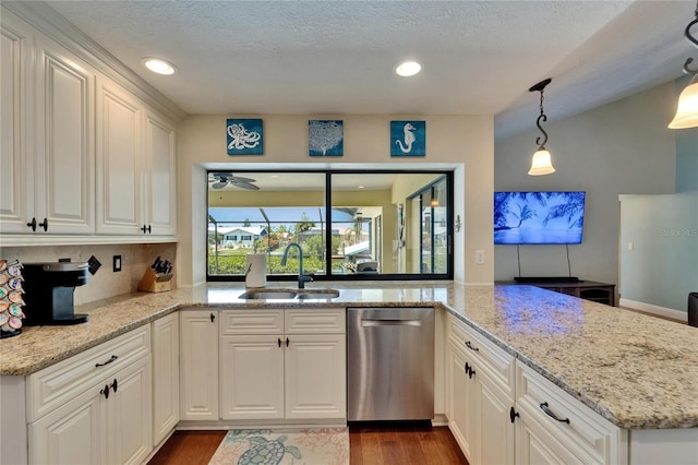907 Golf Island Dr, Apollo Beach, FL 33572 - kitchen featuring dishwasher, a sink, white cabinetry, light stone counters, and recessed lighting