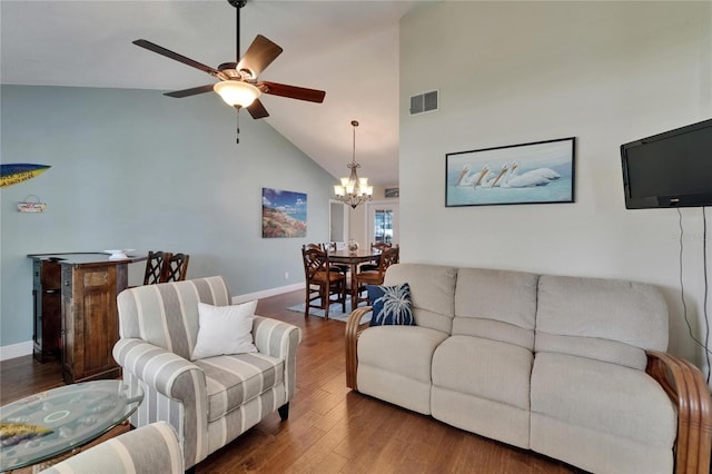 907 Golf Island Dr, Apollo Beach, FL 33572 - living room featuring high vaulted ceiling, a chandelier, wood finished floors, ceiling fan, and baseboards