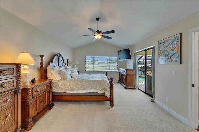 907 Golf Island Dr, Apollo Beach, FL 33572 - bedroom featuring access to exterior, light carpet, lofted ceiling, ceiling fan, and baseboards