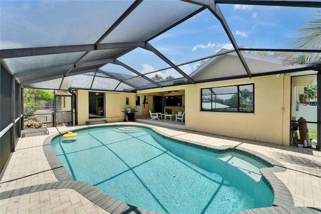 907 Golf Island Dr, Apollo Beach, FL 33572 - swimming pool featuring a patio area and glass enclosure
