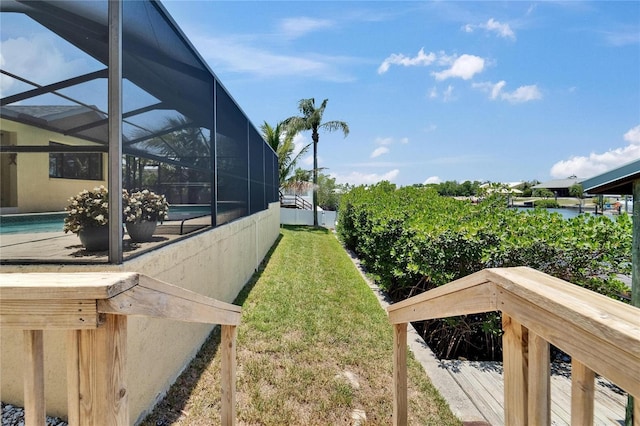 907 Golf Island Dr, Apollo Beach, FL 33572 - view of grassy yard featuring an outdoor pool and a lanai