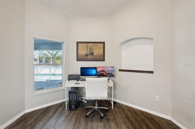 home office with baseboards and wood finished floors