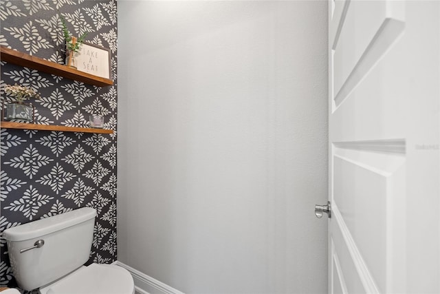 4108 Mellon Dr, Odessa, FL 33556 - bathroom with toilet, baseboards, and wallpapered walls