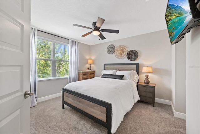 4108 Mellon Dr, Odessa, FL 33556 - bedroom featuring light colored carpet, baseboards, and a ceiling fan