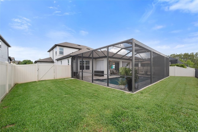 4108 Mellon Dr, Odessa, FL 33556 - rear view of house with a lanai, a yard, and a fenced backyard