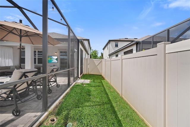 4108 Mellon Dr, Odessa, FL 33556 - view of yard featuring a lanai, a patio, and a fenced backyard