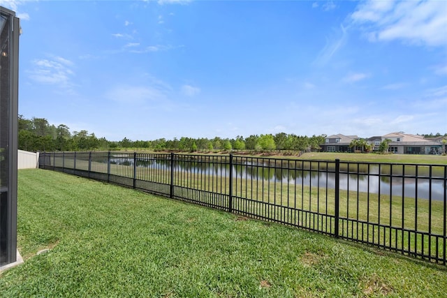 4108 Mellon Dr, Odessa, FL 33556 - view of yard with fence and a water view
