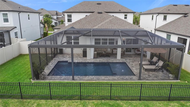 4108 Mellon Dr, Odessa, FL 33556 - rear view of property with a patio area, roof with shingles, a fenced backyard, and a lawn