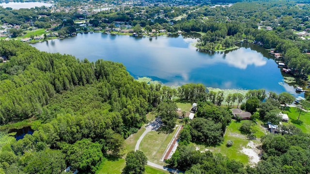 22129 Carson Dr, Land O Lakes, FL 34639 - drone / aerial view featuring a wooded view and a water view