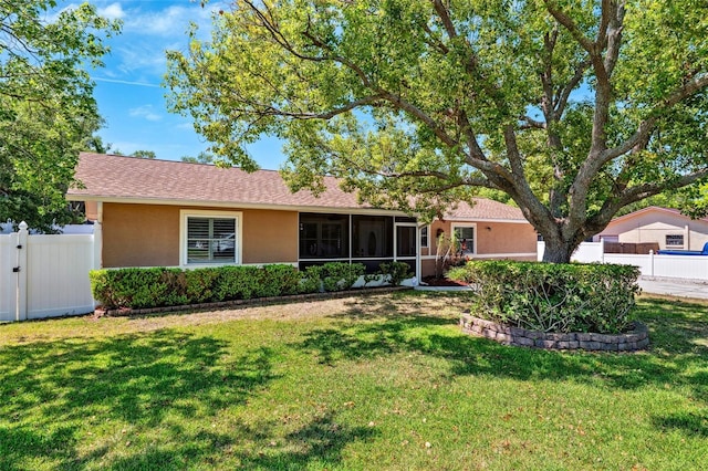 506 Spring Tree Ct, Tarpon Springs, FL 34689 - ranch-style house featuring stucco siding, a sunroom, and a gate