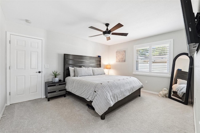 506 Spring Tree Ct, Tarpon Springs, FL 34689 - bedroom featuring carpet flooring, baseboards, and a ceiling fan