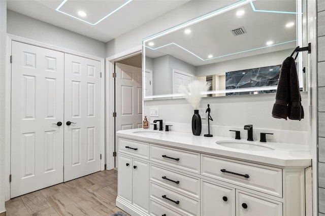 506 Spring Tree Ct, Tarpon Springs, FL 34689 - full bathroom featuring double vanity and recessed lighting