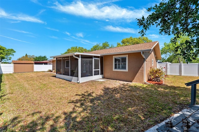 506 Spring Tree Ct, Tarpon Springs, FL 34689 - rear view of property with a sunroom and stucco siding