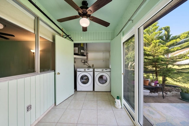 laundry area with light tile patterned floors, laundry area, ceiling fan, and washer and dryer