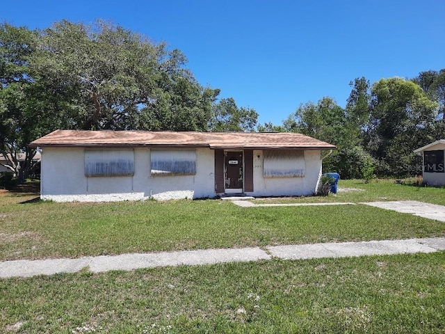 9355 Pinero St, Spring Hill, FL 34608 - view of front of house with a front yard