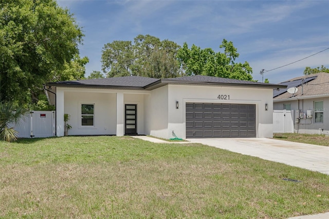 view of front of home with driveway, fence, an attached garage, stucco siding, and a front lawn