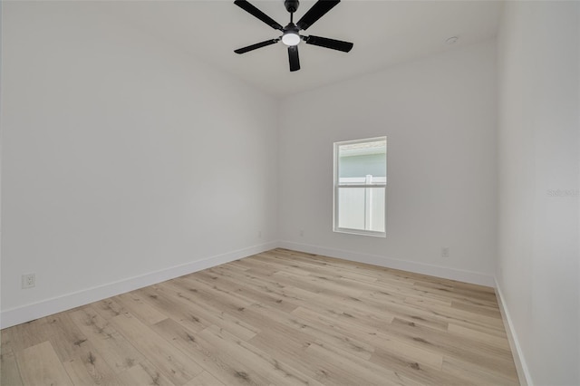 unfurnished room with light wood-style floors, ceiling fan, and baseboards