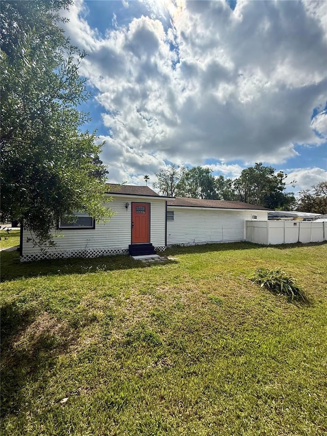 1318 W Broad St, Tampa, FL 33604 - exterior space featuring a lawn, fence, and entry steps