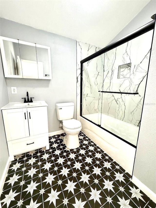 1318 W Broad St, Tampa, FL 33604 - full bath with shower / bath combination with glass door, vanity, tile patterned floors, toilet, and baseboards