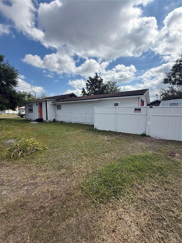 1318 W Broad St, Tampa, FL 33604 - exterior space with a yard and fence