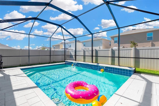 view of pool with a patio area, a fenced backyard, a fenced in pool, and a residential view