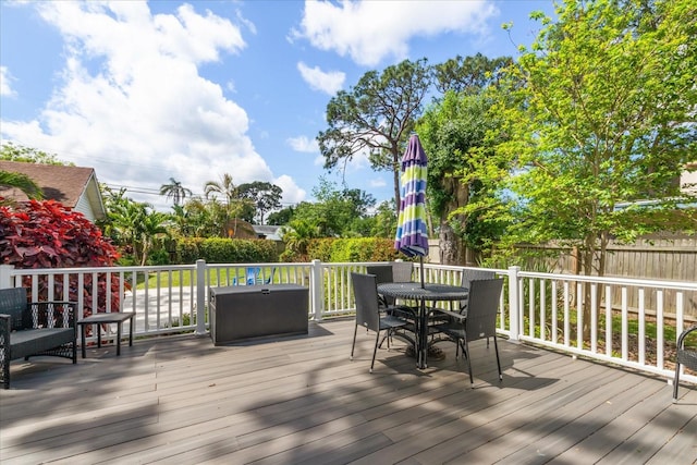 1905 Mckinley St, Clearwater, FL 33765 - wooden deck featuring outdoor dining area