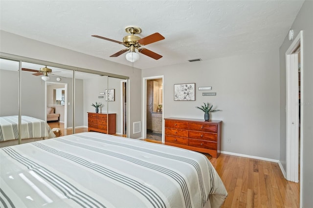 8763 Matthew St, Seminole, FL 33772 - bedroom with visible vents, baseboards, a closet, and light wood-style floors