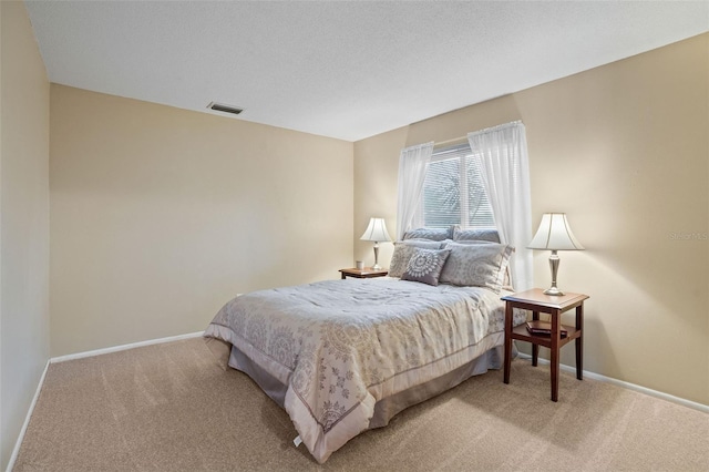 8763 Matthew St, Seminole, FL 33772 - bedroom with visible vents, baseboards, and light colored carpet