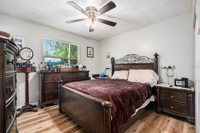 186 Grand Ave, Brooksville, FL 34604 - bedroom with light wood-style flooring and ceiling fan