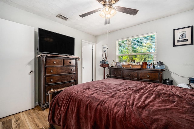 186 Grand Ave, Brooksville, FL 34604 - bedroom featuring light wood finished floors and a ceiling fan