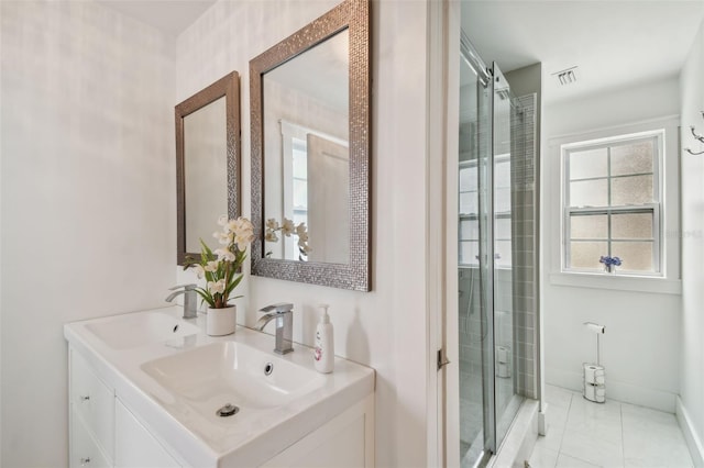 2704 W Main St, Tampa, FL 33607 - full bathroom featuring a shower stall, a sink, visible vents, and double vanity