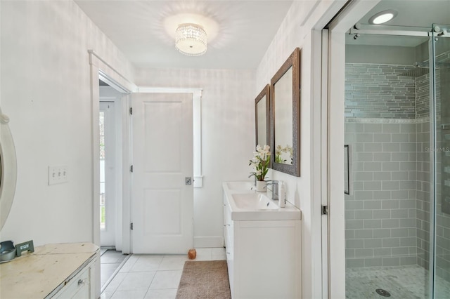 2704 W Main St, Tampa, FL 33607 - full bath featuring vanity, tile patterned floors, and a stall shower
