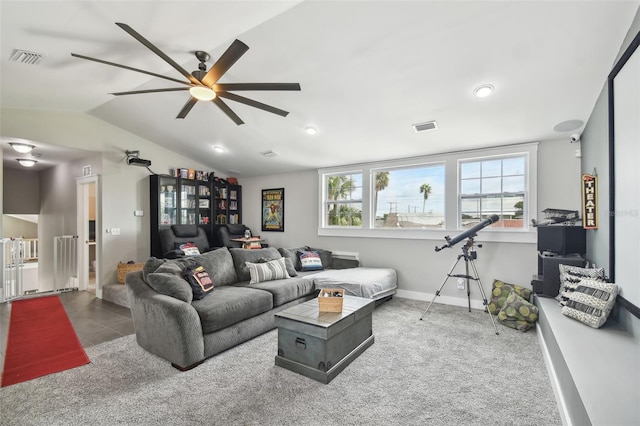 2704 W Main St, Tampa, FL 33607 - living area featuring lofted ceiling, visible vents, carpet floors, and ceiling fan