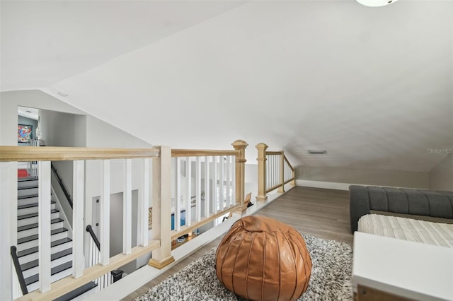 2704 W Main St, Tampa, FL 33607 - sitting room with vaulted ceiling, wood finished floors, visible vents, and baseboards